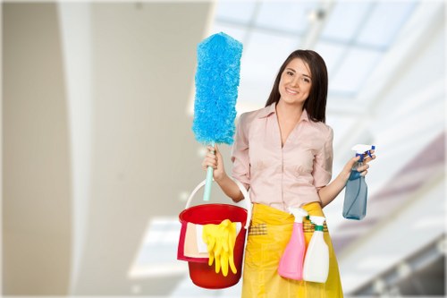 Carpet cleaning operative checking safety measures before starting work