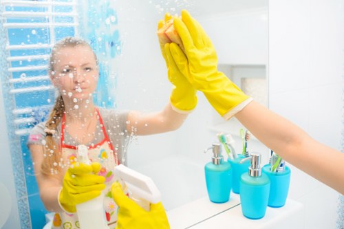 Carpet cleaning team managing safety in an occupied property